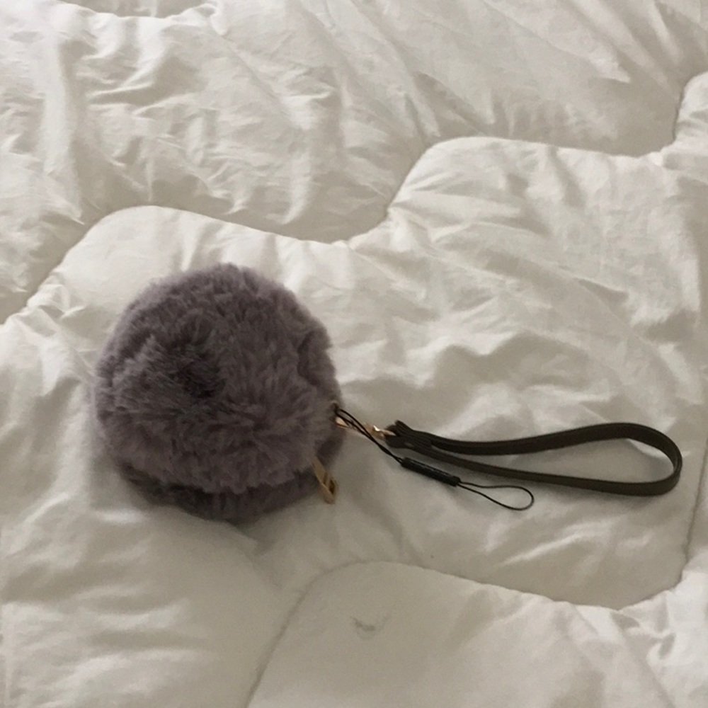 Almost new faux fur coins purse
